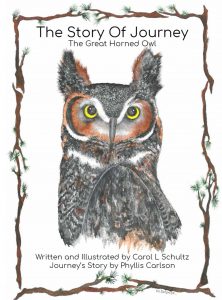UPPAA A hand-drawn illustration of a great horned owl is centered on the cover of a book titled "The Story Of Journey: The Great Horned Owl," by Carol L. Schultz and Phyllis Carlson. The border features pine branches.