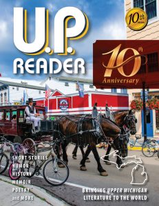 UPPAA A horse-drawn carriage passes through a street lined with buildings and bicycles. The cover text reads "U.P. Reader 10th Anniversary," with additional text about Upper Michigan literature and included genres.