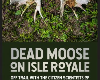 UPPAA Two large moose antlers lie on grass. Below, text reads: "Dead Moose on Isle Royale: Off Trail with the Citizen Scientists of the Wolf-Moose Project, Jeffrey M. Holden.